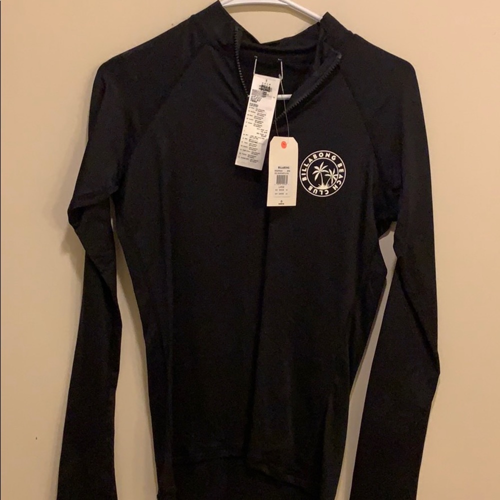 Women’s billabong wetshirt/swim cover.